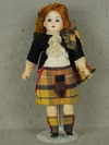 Appraisal: DOLL - girl doll in original scottish costume with red