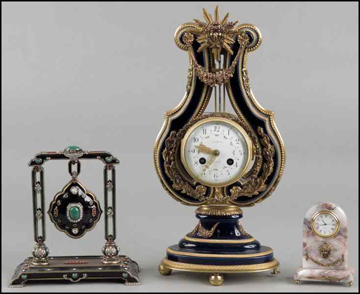 Appraisal: THREE DECORATIVE CLOCKS One Jay Strongwater and two other Condition