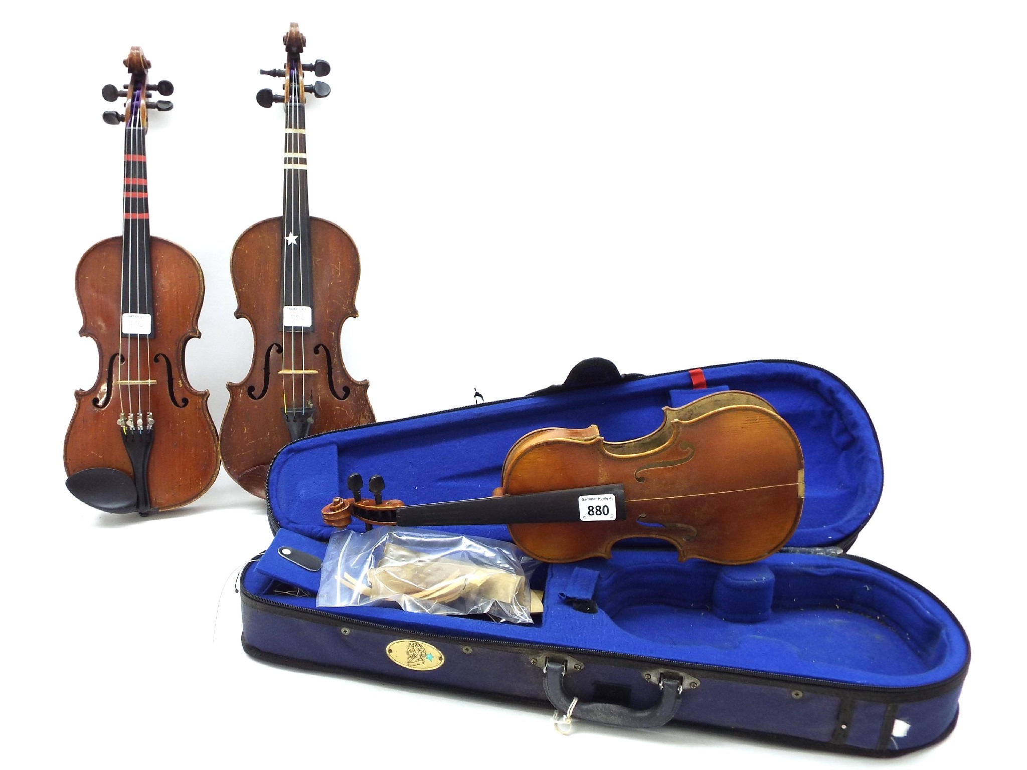 Appraisal: Child's violin in need of restoration cased also two three-quarter