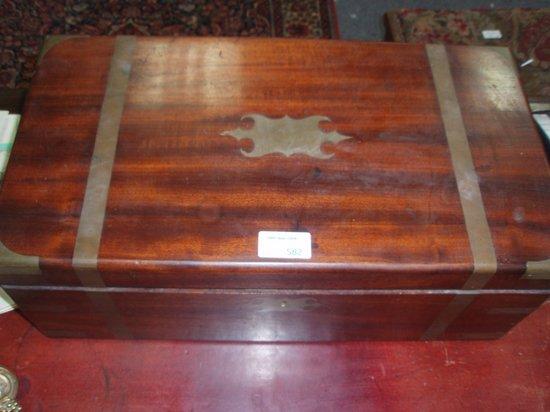 Appraisal: A mid Victorian mahogany brass-bound writing box with cartouche to