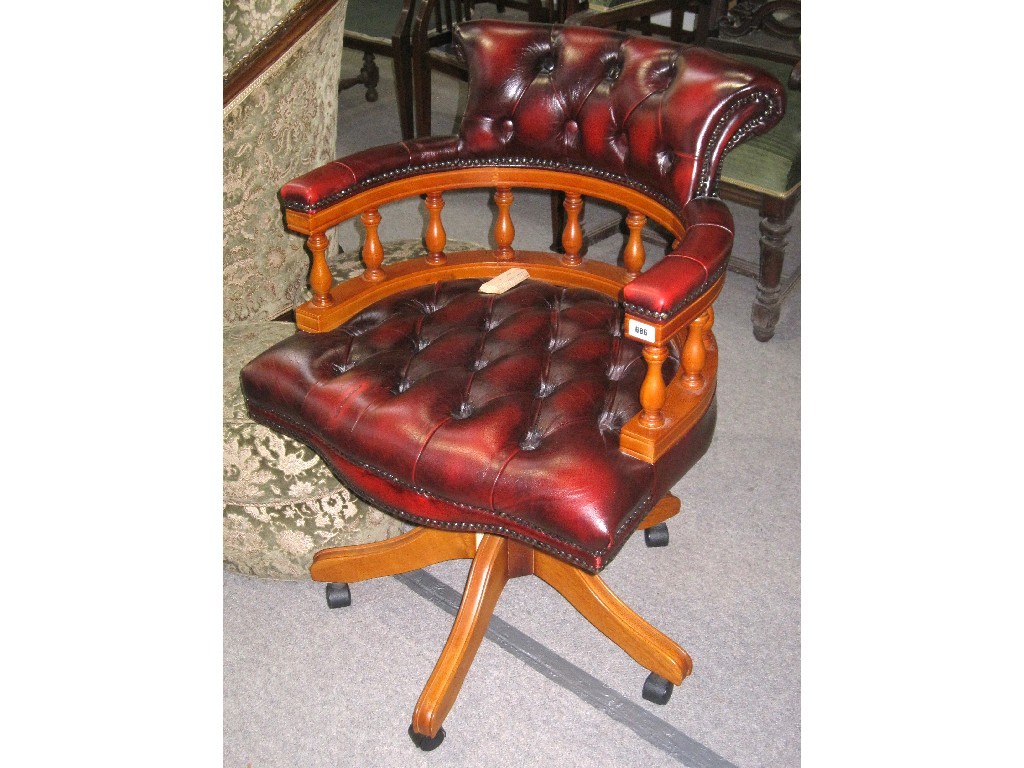 Appraisal: Leather upholstered swivel desk chair