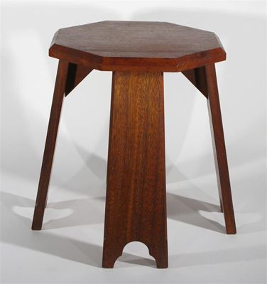 Appraisal: An oak side table in the style of Liberty Co