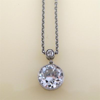 Appraisal: A diamond pendant the circular cut diamond suspends from a