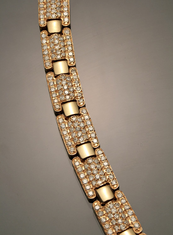 Appraisal: -Karat Yellow-Gold and Diamond Flexible Bracelet Set with a pav