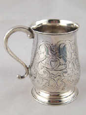 Appraisal: A Georgian silver child's mug with chased decoration by Hester