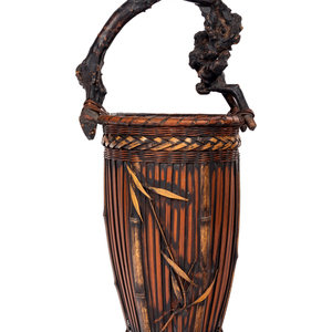 Appraisal: A Bamboo Flowering Arranging Basket TH CENTURY the slender ovoid