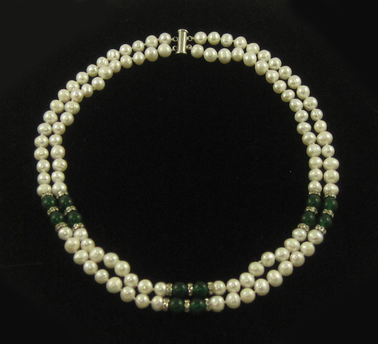 Appraisal: DOUBLE STRAND WHITE PEARL NECKLACE strung with white pearls and