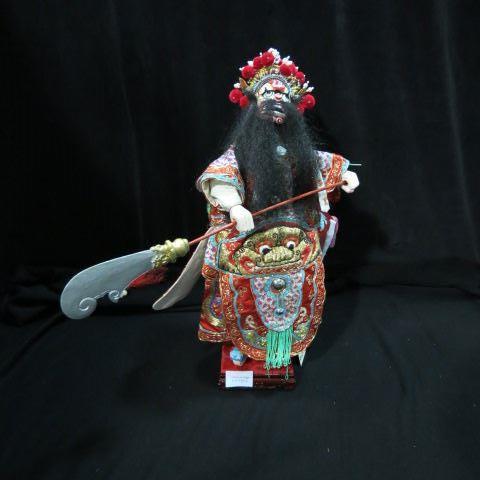 Appraisal: Chinese Embroidered Silk Figurine of a god carved wood base