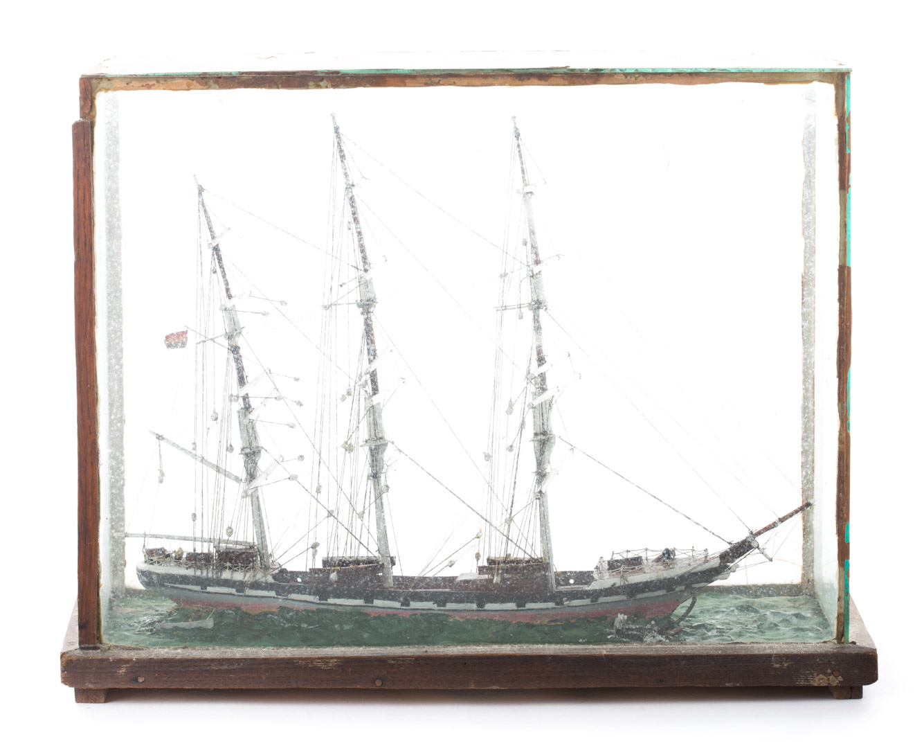 Appraisal: Painted and stained wood frigate model in glass display case