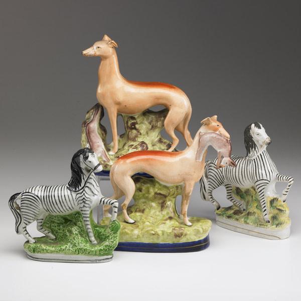 Appraisal: STAFFORDSHIRE Pair of zebra figurines together with a pair of