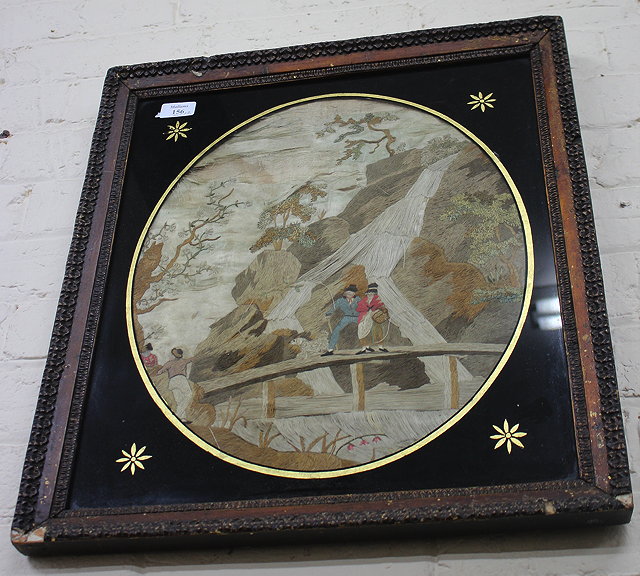 Appraisal: A REGENCY OVAL SILKWORK PICTURE depicting two walkers on a