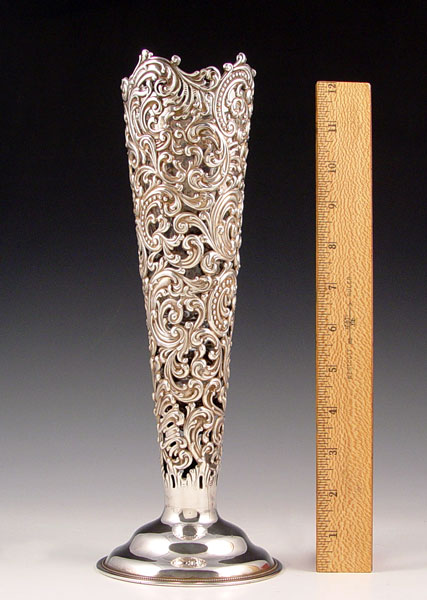 Appraisal: DOMINICK HAFF REPOUSSE STERLING VASE Ornate repousse and open pierce