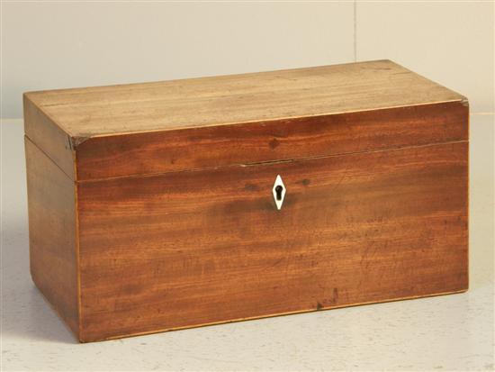 Appraisal: th century mahogany tea caddy with two covered compartments and