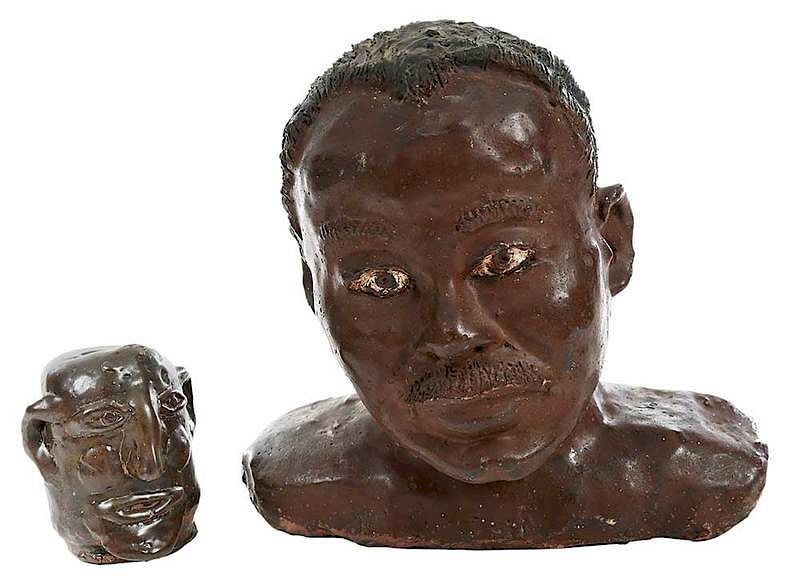 Appraisal: Two Folk Art Busts th century redware African-American bust unknown