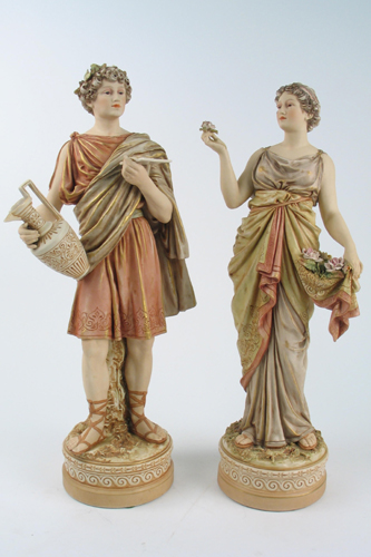 Appraisal: PAIR ROYAL DUX POTTERY FIGURES Young man and woman in