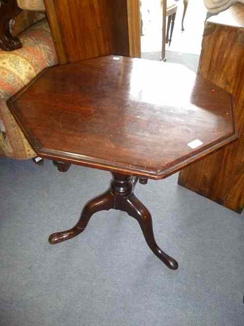 Appraisal: A MAHOGANY OCTAGONAL TILT TOP TRIPOD TABLE wide