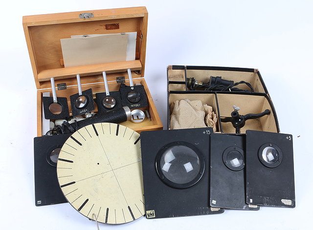 Appraisal: A QUANTITY OF VARIOUS OPTICAL LABORATORY EQUIPMENT Lenses together with