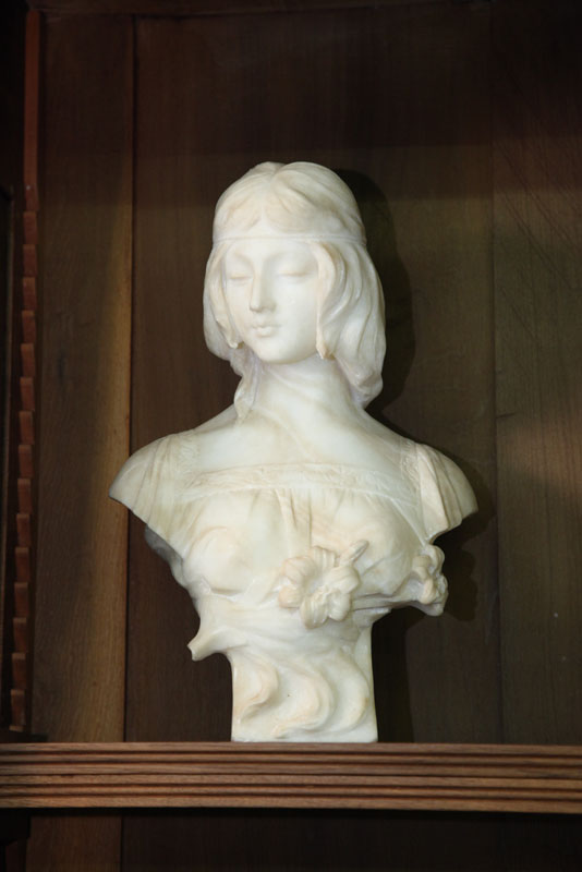 Appraisal: MARBLE BUST Classical woman with floral accents Artist signed on