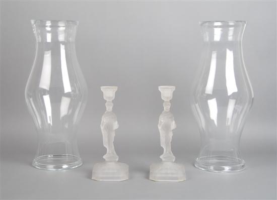 Appraisal: A Pair of American Frosted Glass Figural Candlesticks Height of