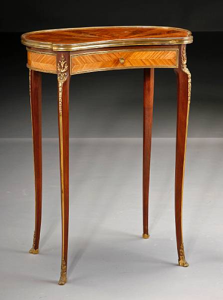 Appraisal: A Louis XV XVI style gilt bronze mounted inlaid mahogany