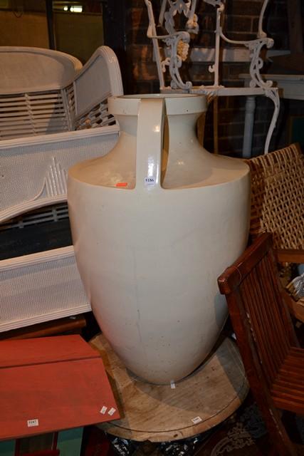 Appraisal: A LARGE COMPOSITE STONE WHITE URN A LARGE COMPOSITE STONE