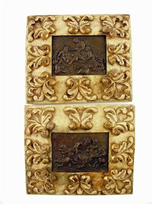 Appraisal: A pair of cast bronzed panels Bacchanalian scenes of putti