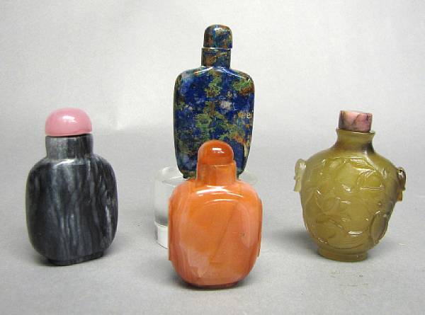 Appraisal: A group of four hardstone snuff bottles Including two of