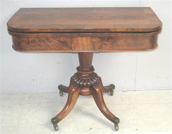 Appraisal: Late Regency mahogany and cross-banded folding card table with baize