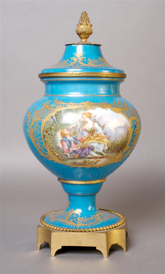 Appraisal: A Sevres Style Lidded Urn Height inches