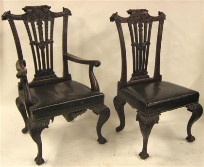 Appraisal: Set of eight carved mahogany dining chairs Comprising two armchairs