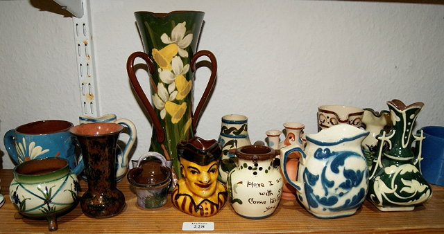 Appraisal: Group of Devon Potteryincluding a tall tyg a character mug