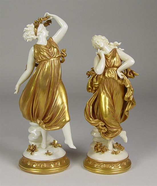 Appraisal: Pair of Dresden Gilt Figures Ladies with gold lustre gowns