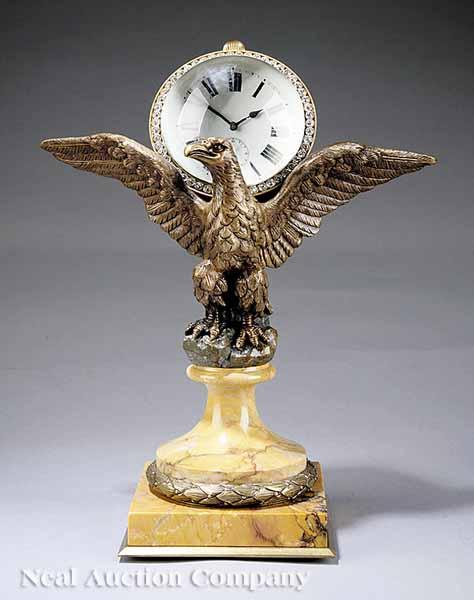 Appraisal: A French Patinated Bronze and Yellow Sienna Marble Desk Clock