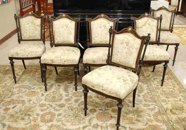 Appraisal: A SET OF SIX NAPOLEON III EBONIZED WALNUT CHAIRS Louis