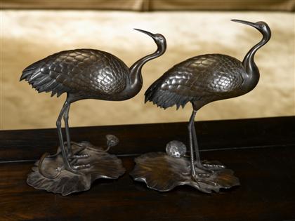 Appraisal: Pair of Japanese patinated bronze egrets