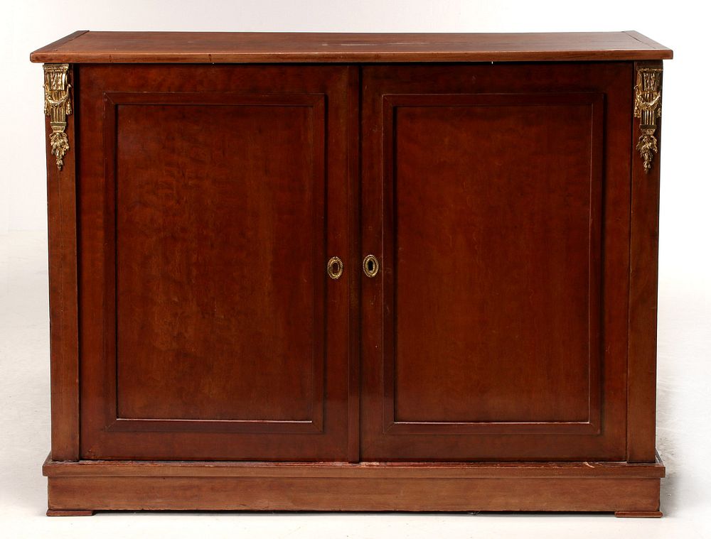 Appraisal: A CIRCA CONTINENTAL FRUITWOOD SIDE CABINET The rectangular top having