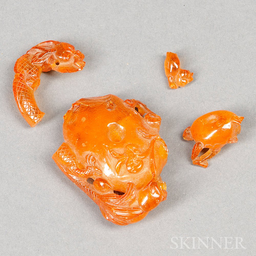 Appraisal: Amber Pendant China th century depicting a dragon lg in