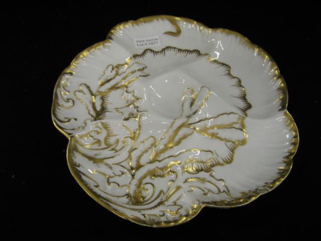 Appraisal: Haviland Limoges Porcealin Oyster Plate elaborate gold trim circa excellent