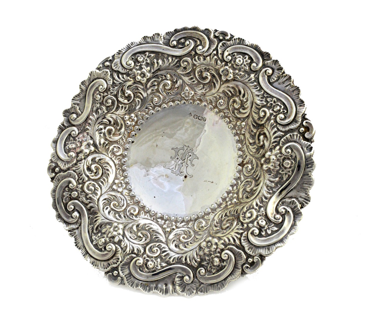 Appraisal: A late Victorian silver shaped circular dish with floral foliate