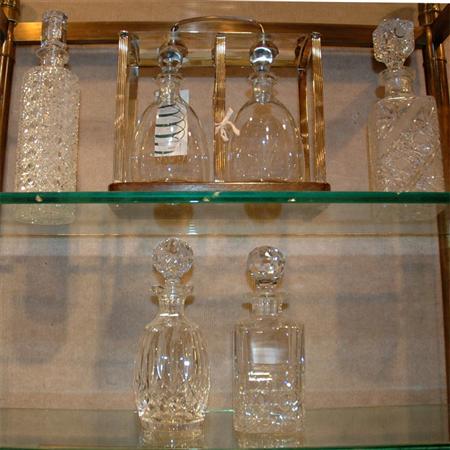 Appraisal: Silver Plated Tantalus Together with Four Glass Decanters Estimate -