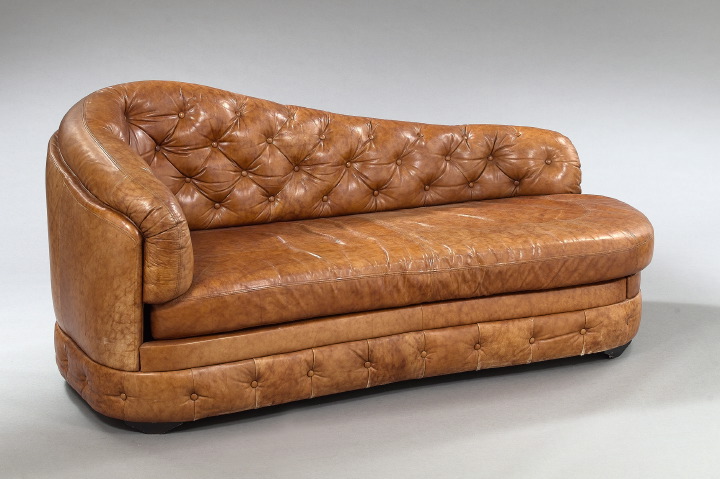 Appraisal: Edwardian Leather-Upholstered Recamier ca the shaped back with tufted leather