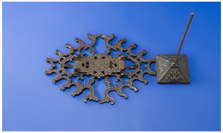 Appraisal: Bronzed Cast Iron folding pen rest trivet for nine pens