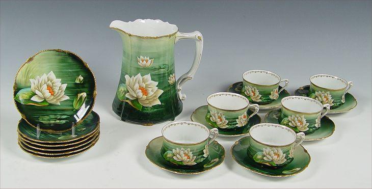 Appraisal: HAND PAINTED BAVARIAN CIDER AND DESSERT SET Hand painted water