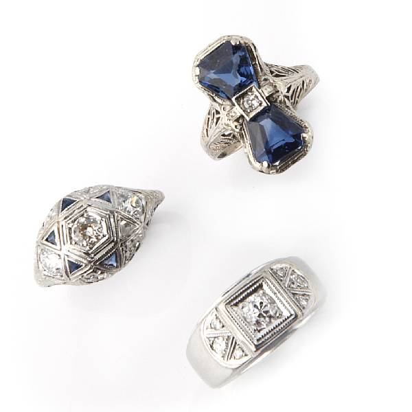 Appraisal: A collection of three diamond synthetic sapphire and k white