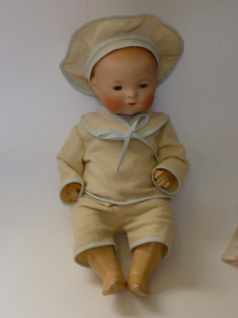 Appraisal: An Armand Marseille bisque head baby doll with blue glass