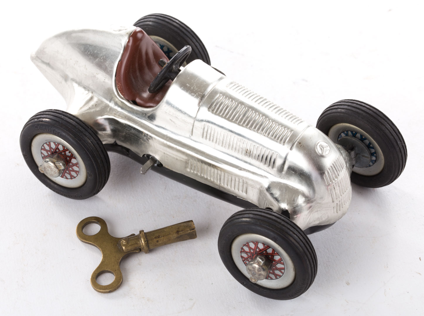 Appraisal: Schuco tin wind-up Mercedes race car late s workable steering