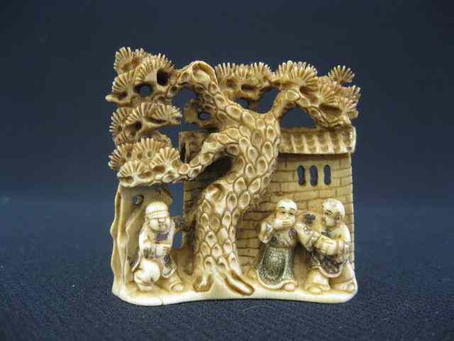 Appraisal: Carved Ivory Netsuke of Villagers fancy polychrome signed ''