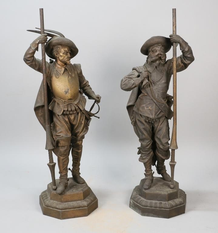 Appraisal: Pair of patinated white metal soldiers Both unsigned Each H