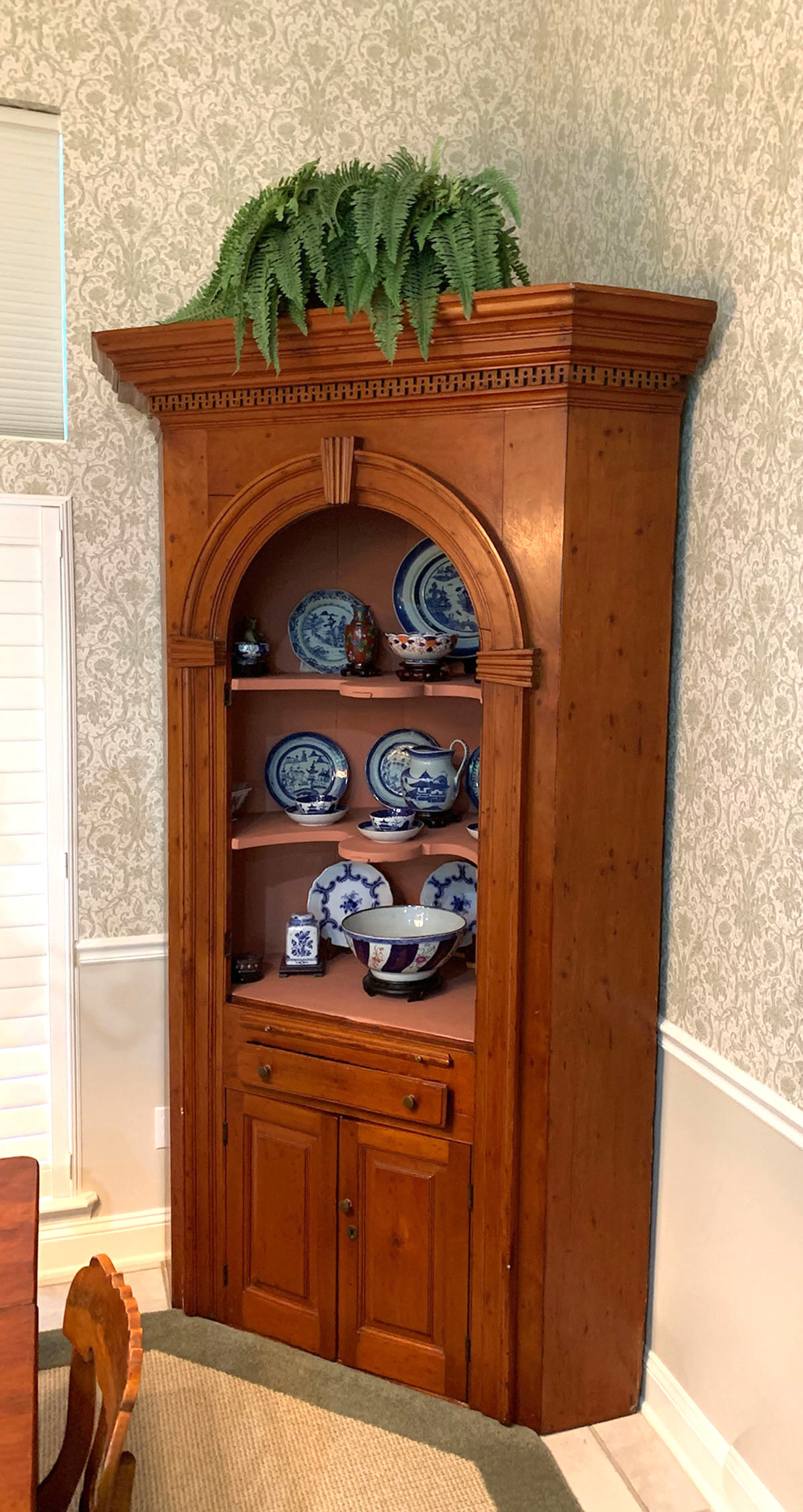 Appraisal: EARLY CHERRY CORNER CUPBOARD Early Corner cupboard made of Cherry