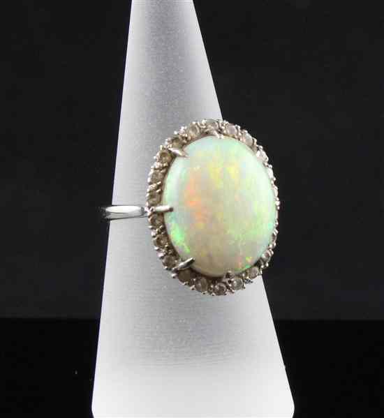 Appraisal: An ct white gold white opal and diamond cluster ring